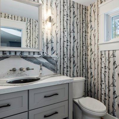 Powder room with birch wallpaper